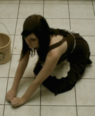 scrubbing the kitchen floor