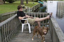 boy sitting with dog